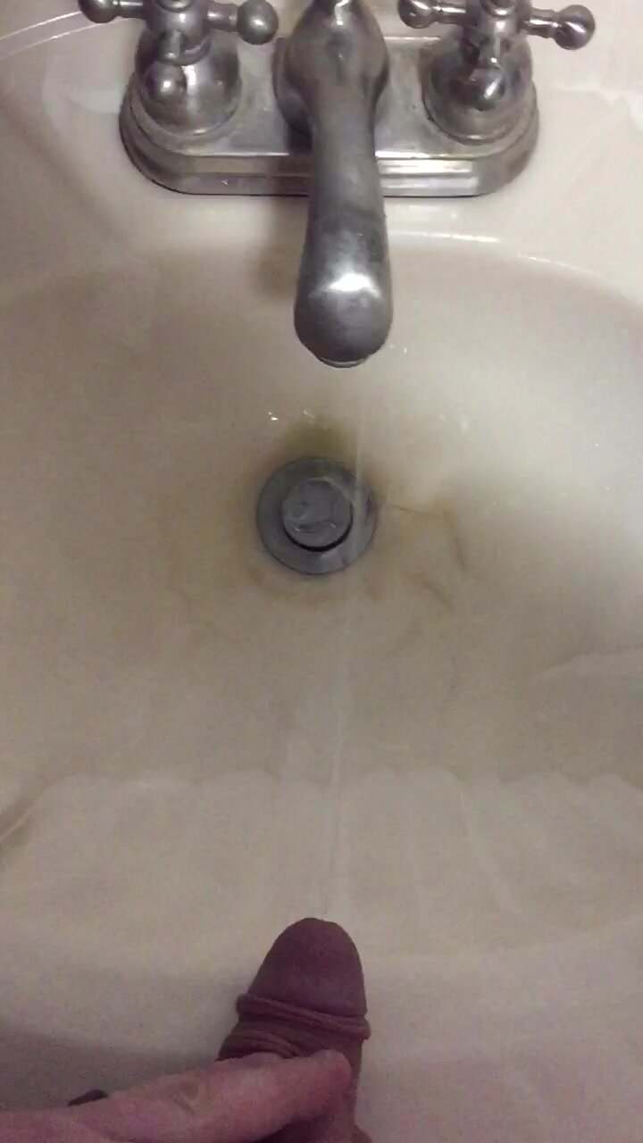 Pissing in sink - video 2
