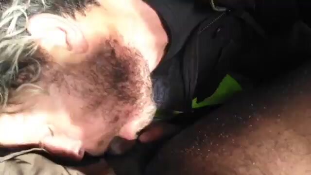 Bearded cocksucker swallowing a black man's load