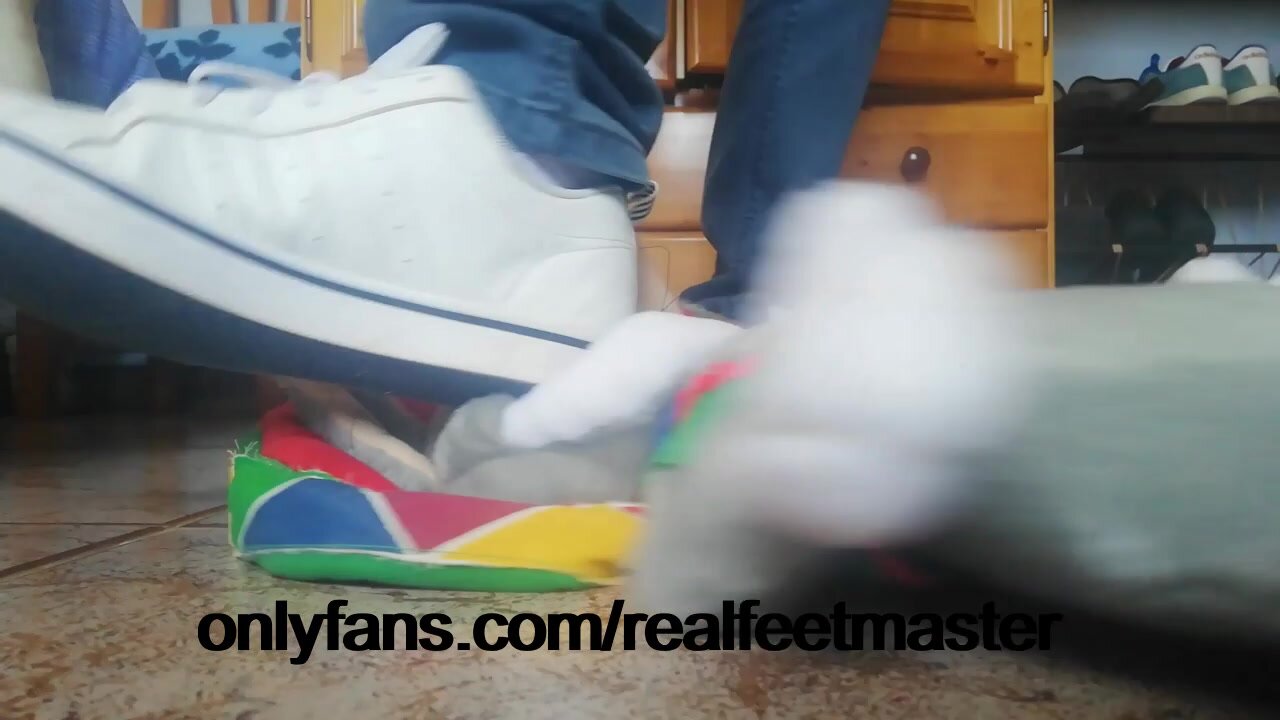 Trampling a stuffed toy in adidas