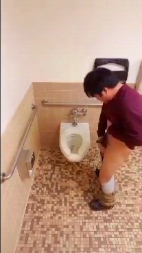 Spying on him in a public bathroom wiping his bum and exposing his tiny dic