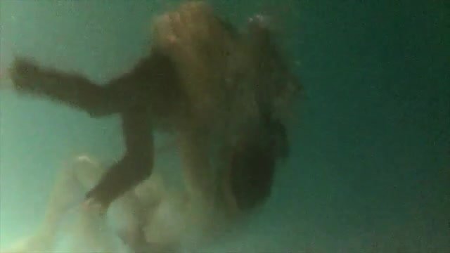 Underwater pool wrestling