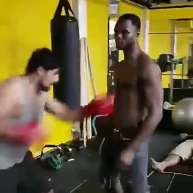 Beautiful black guy punched in abs and face