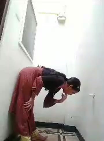 Low res video of indian woman vomiting