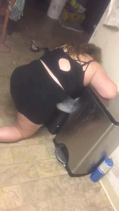 Drunk girl puking in trash