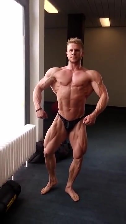Ambitious Bodybuilder showing off