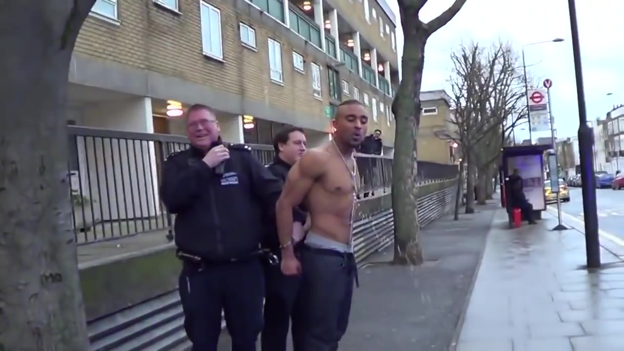 black guy pissing while being arrested