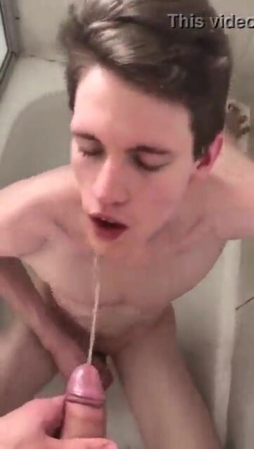 young boy drinks piss in shower