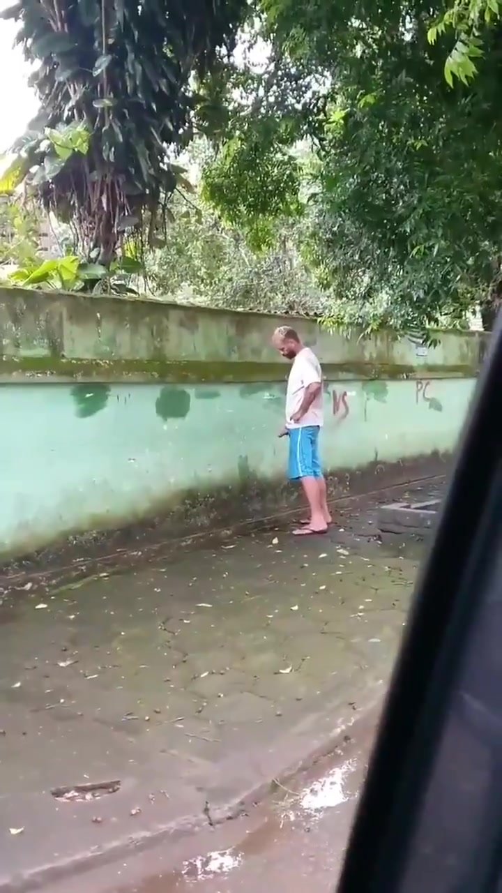 Fat cock pissing in the street