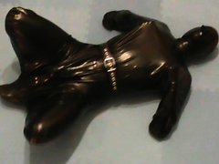Slave as hogsacked rubber puppy