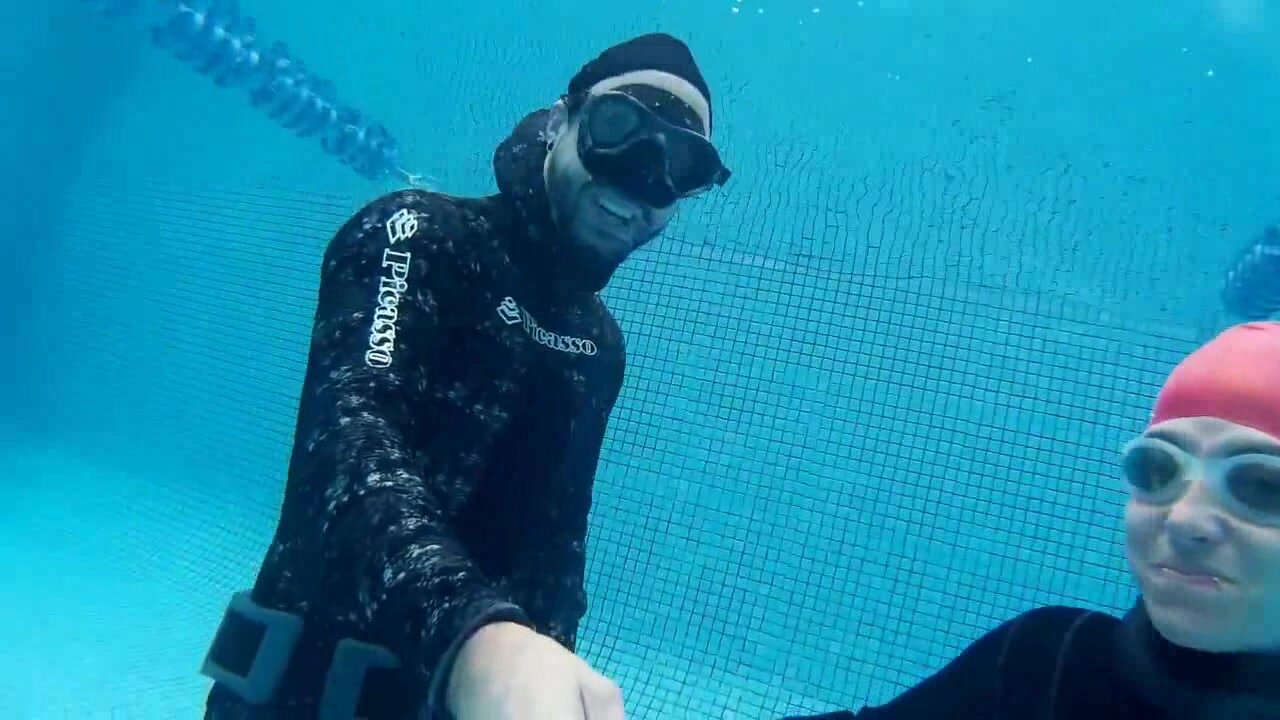 Breatholding underwater in wetsuit - video 2