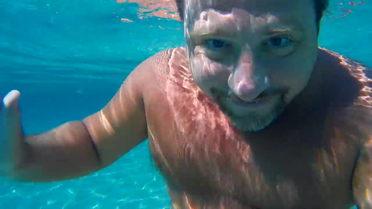 Underwater Handsome Beefy Man Smiling