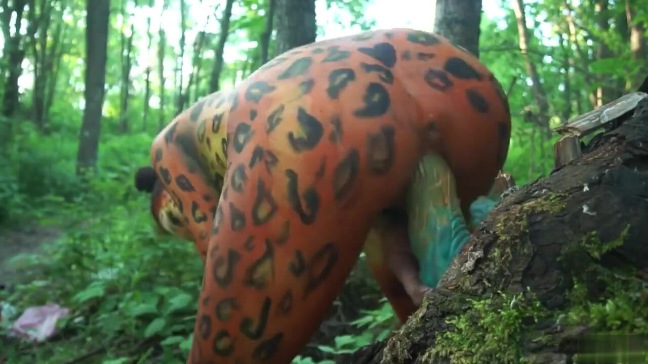 Asian peeing in the forest