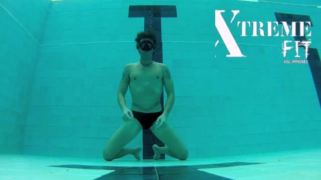 Breatholding underwater in black speedo - video 2