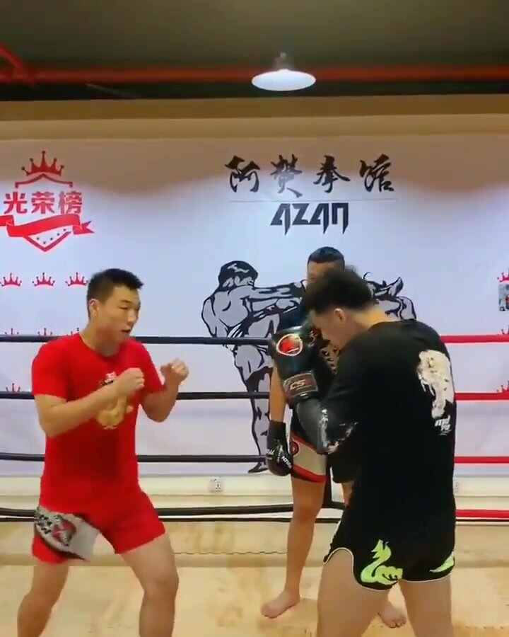 Chinese guy gets kicked in the balls