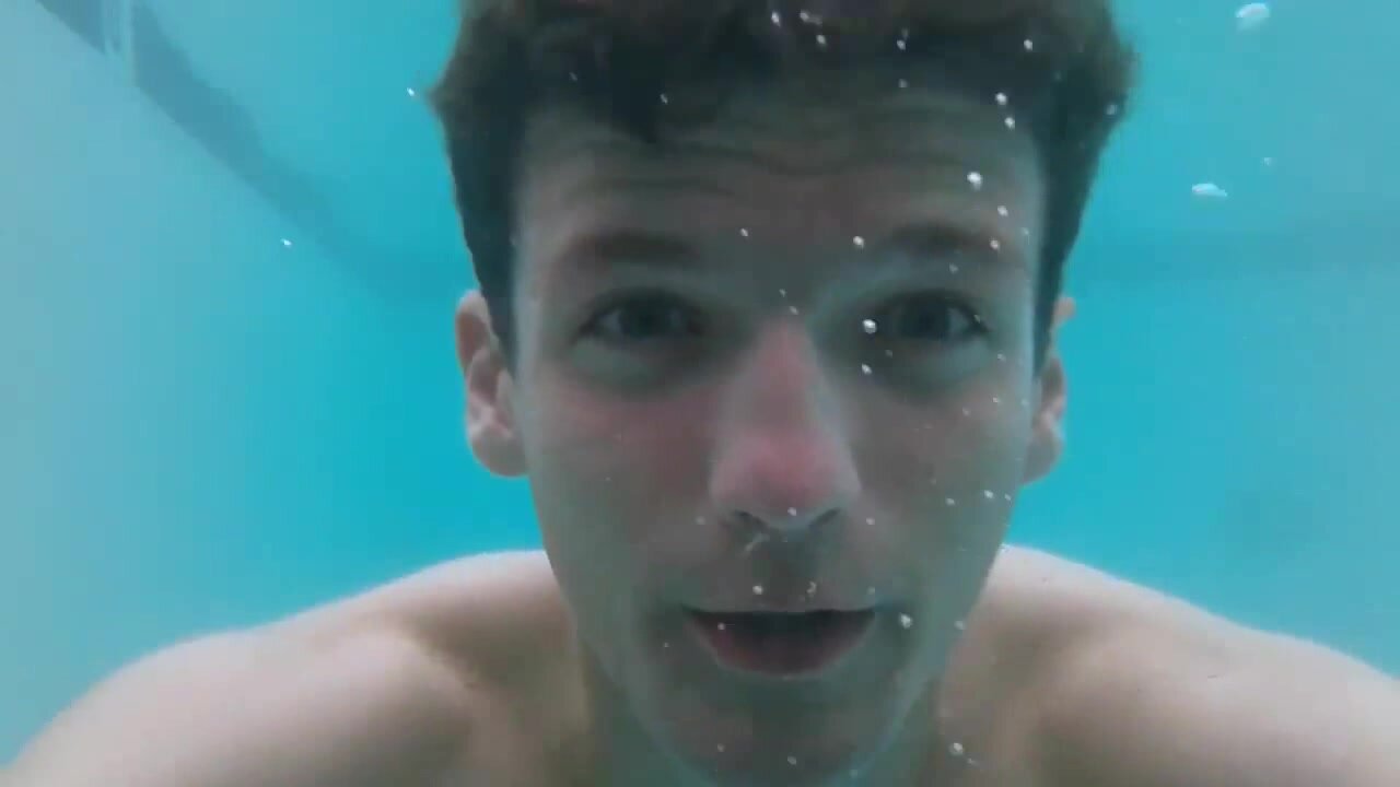 Cutie swimming barefaced underwater - video 4