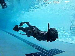 Arab freedivers underwater pool training