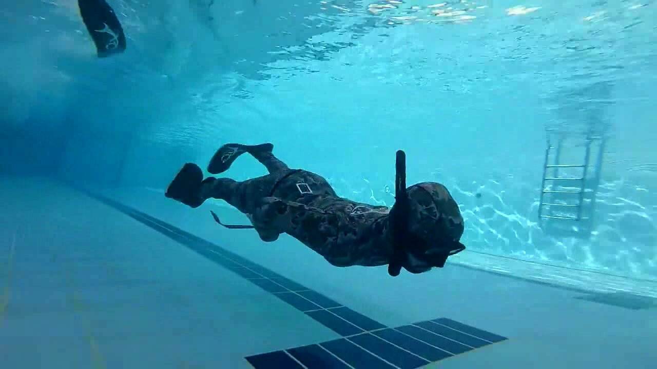 Arab freedivers underwater pool training