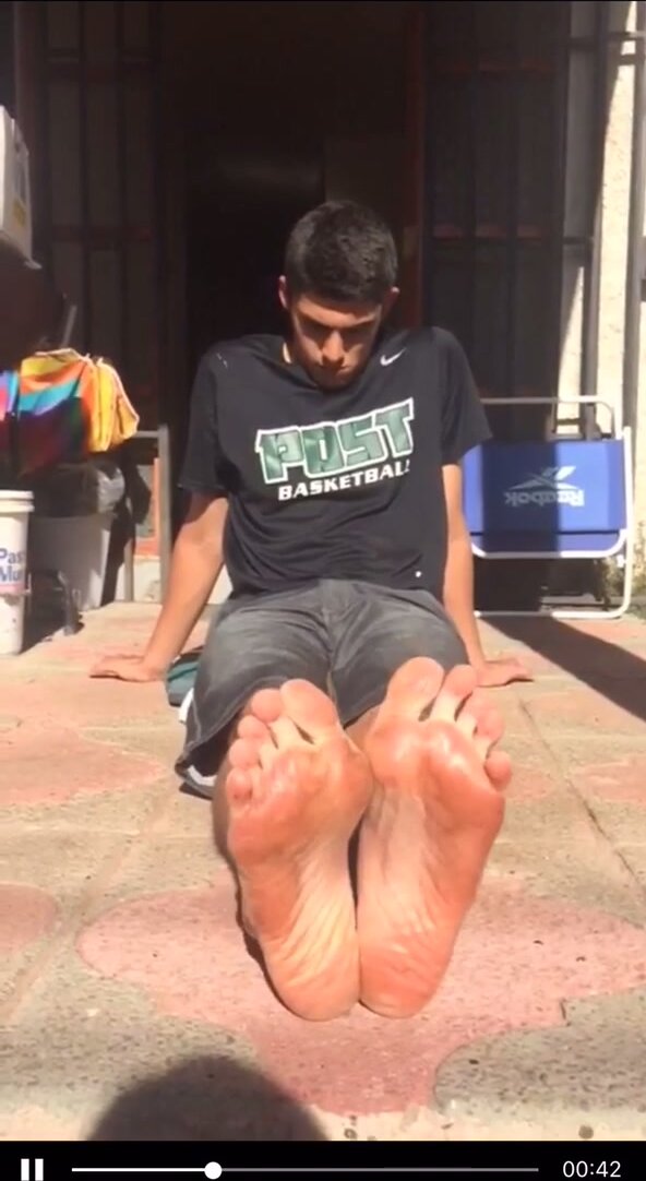 Young guy shows his soles