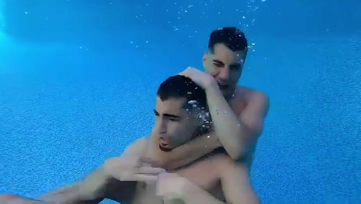 Underwater barefaced fighters in pool