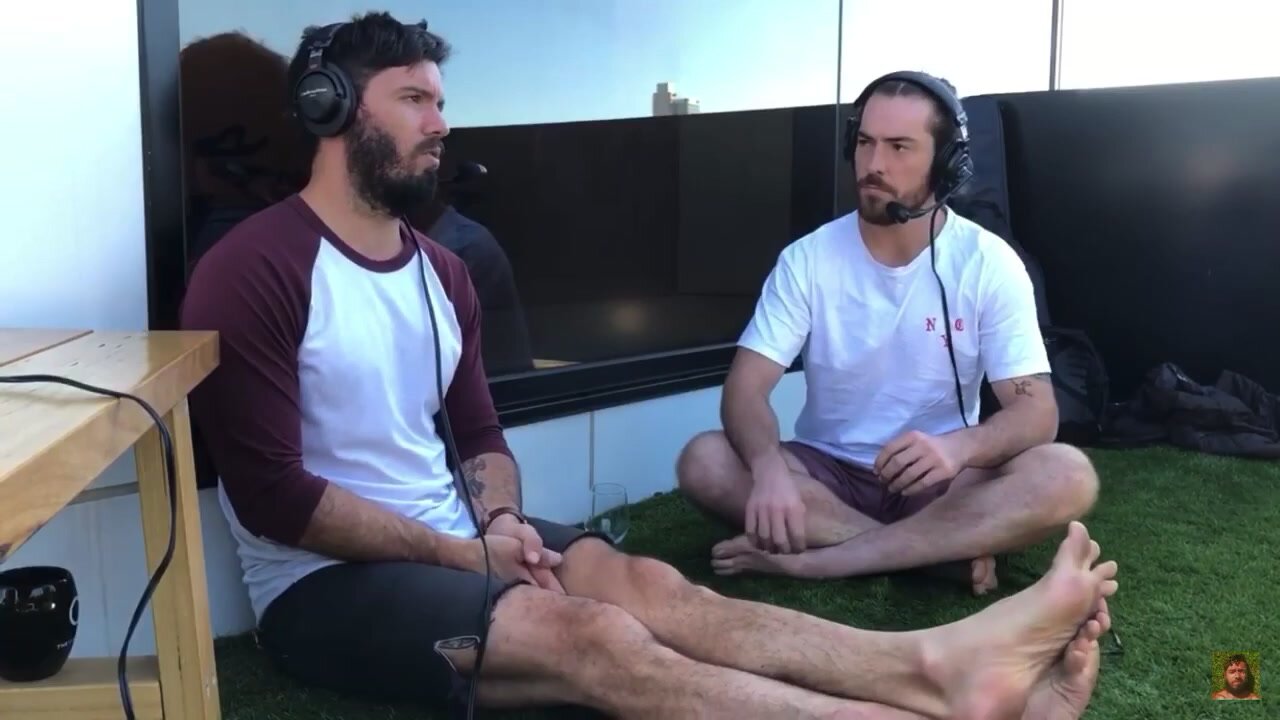 Guy shows feet during interview