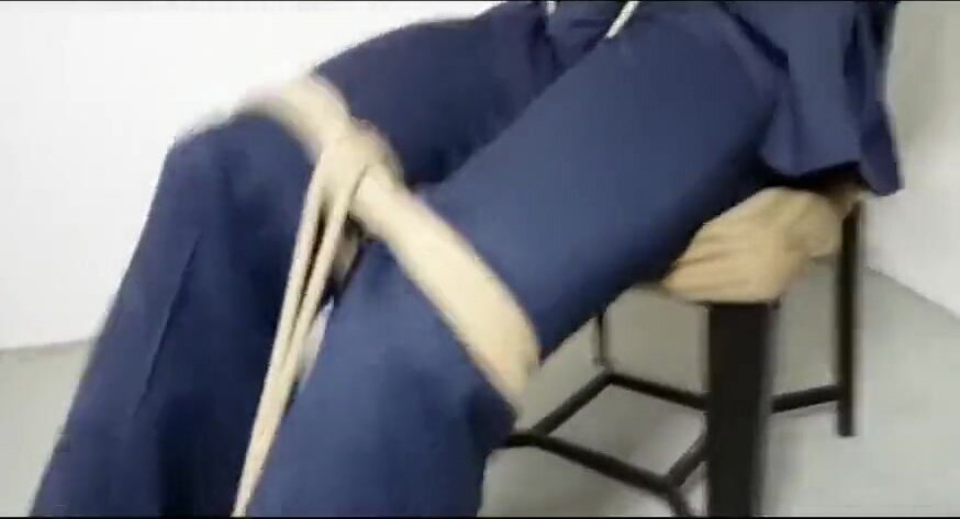 Man in suit tied up - video 2