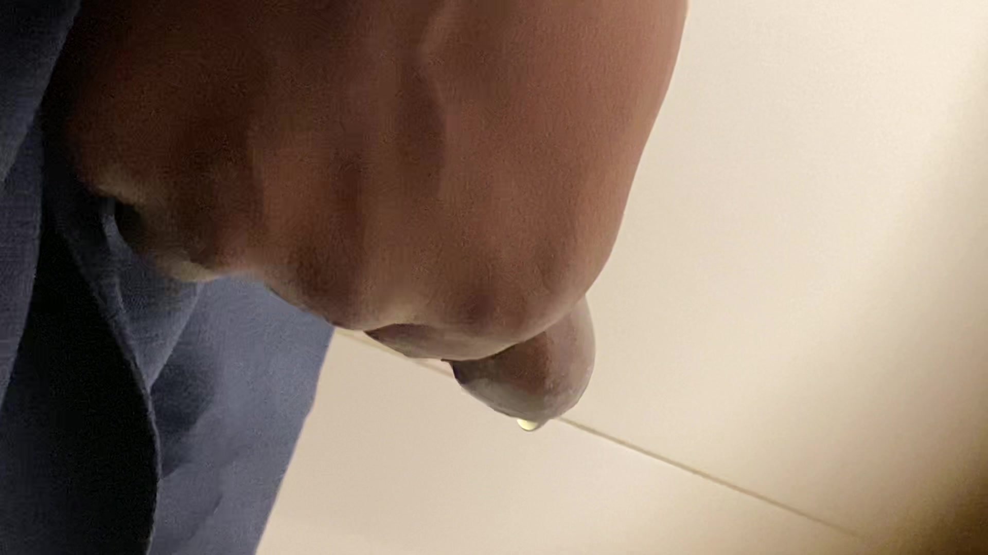 Daddy's black uncut pissing cock