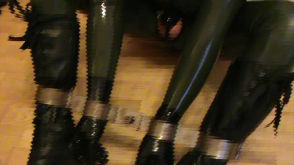 Green and Grey - rubberslave is in the steel rigidcuff
