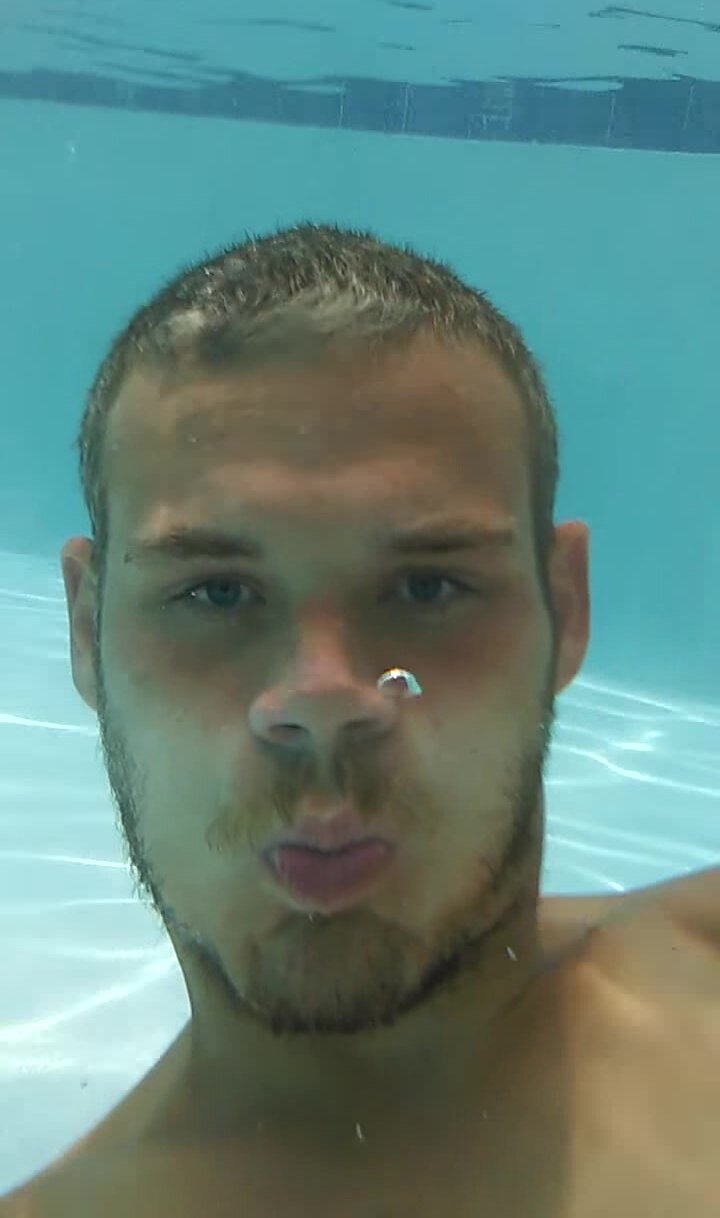 Blond cutie barefaced underwater