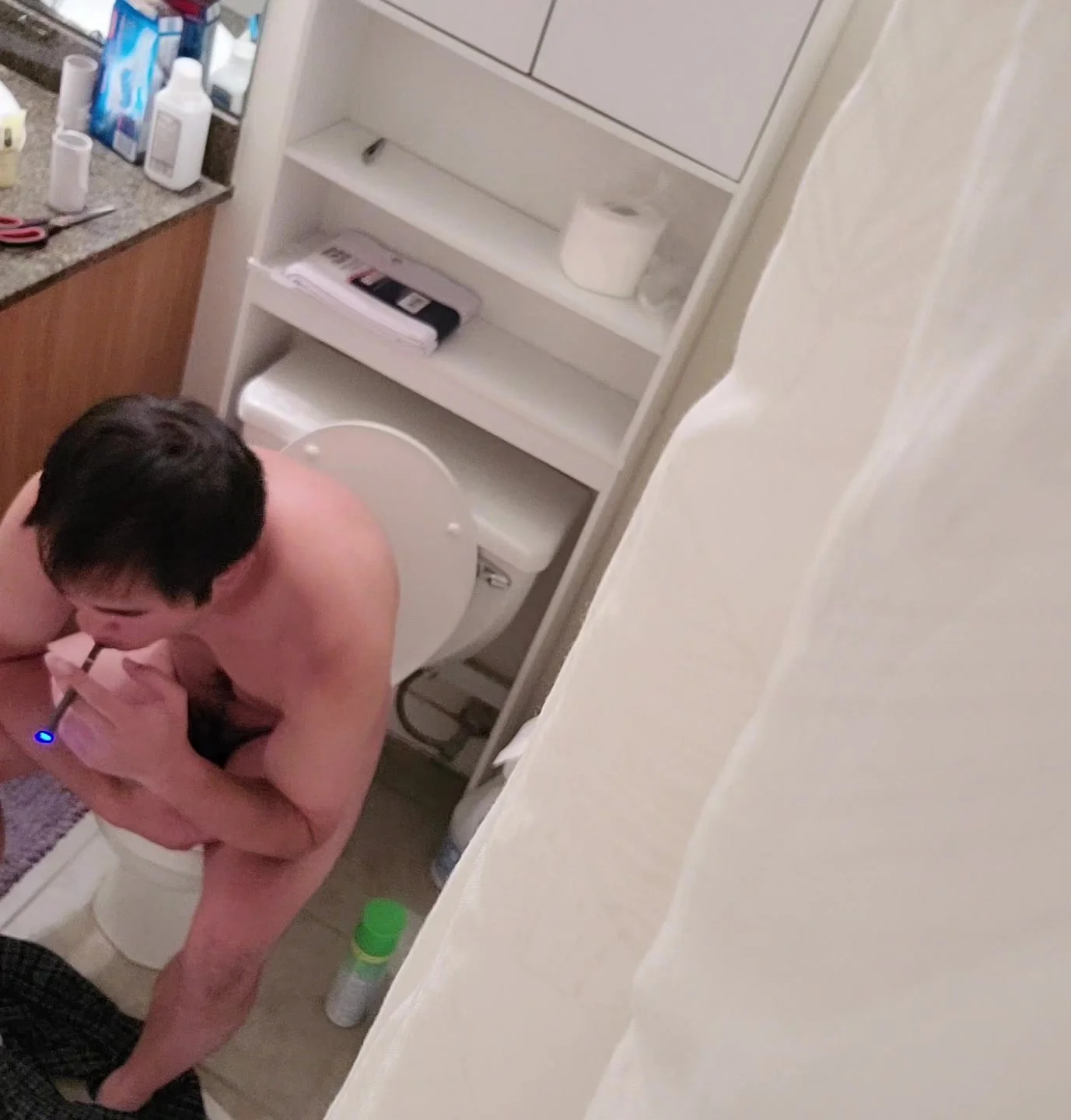 Asian guy spied naked and taking a shit and cleaning penis pic