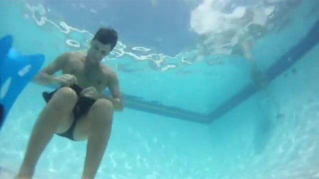 Breatholding barefaced underwater in black speedos - video 2