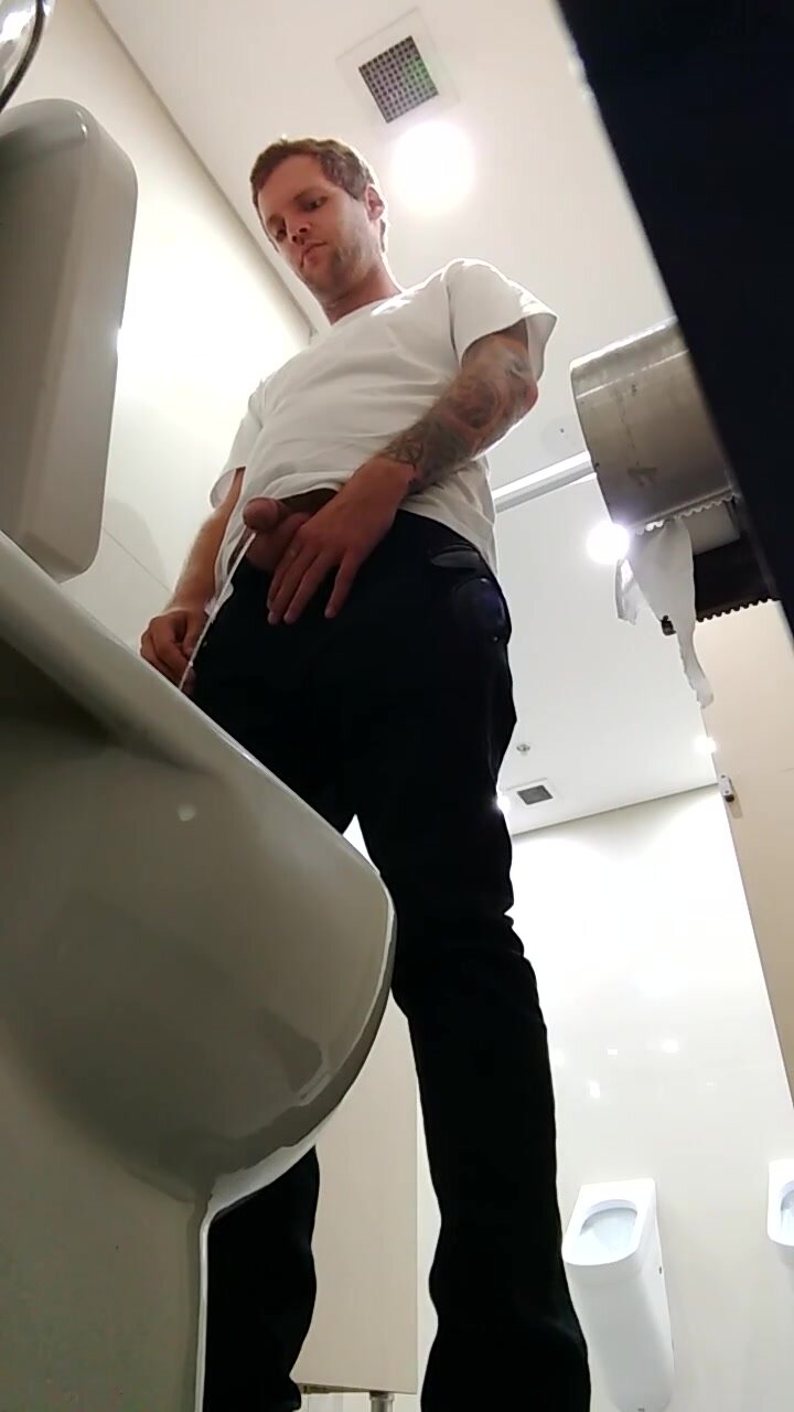 looking up at a hot guy pissing