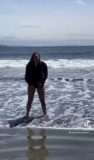 Girl pees herself in the sea