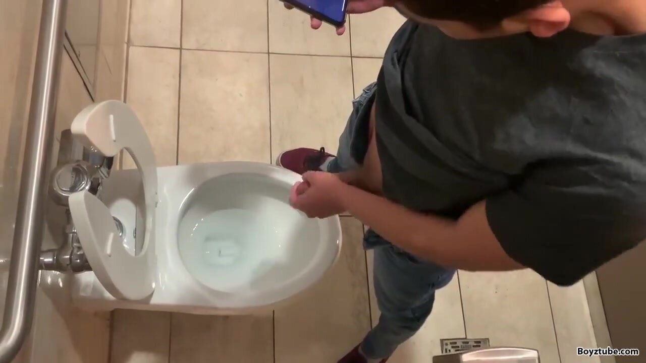 Jerkoff together in University restroom