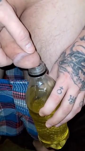 hot guys drinking piss in bottle