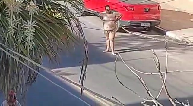 Fat man naked on the street