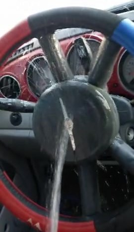 Pissing all over her steering wheel