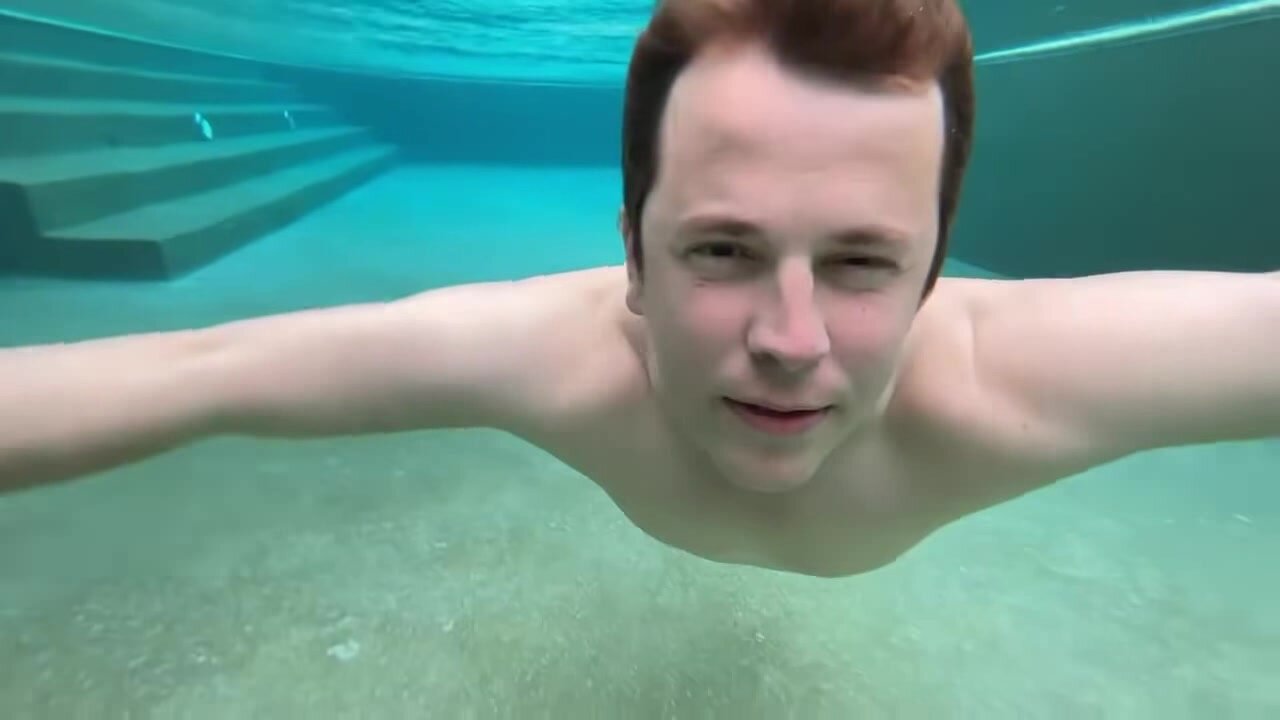 Tom swimming barefaced underwater