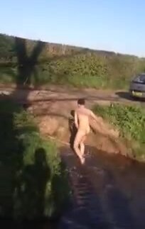 Naked Guy's Friends Make Him Go for a Swim