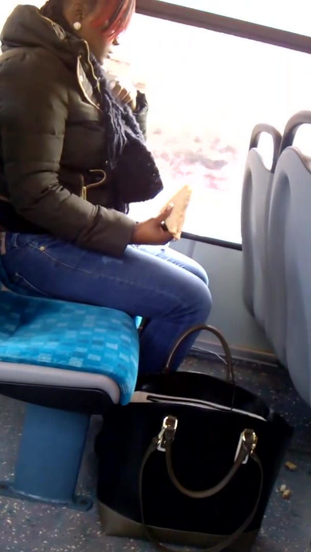 Careless ebony litters on a bus