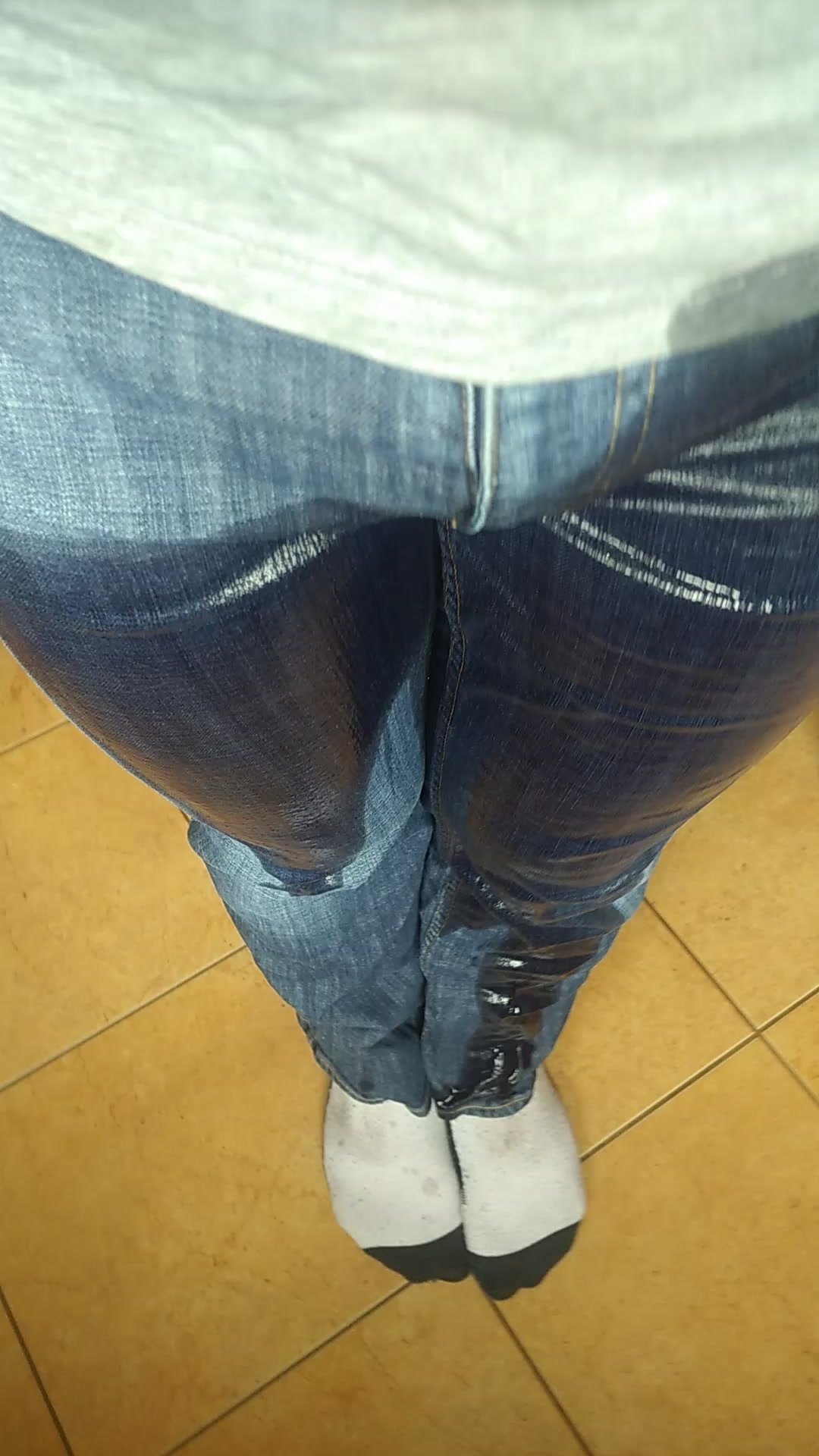 Wetting my jeans and socks in kitchen