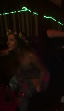 girl pisses on guy at a party