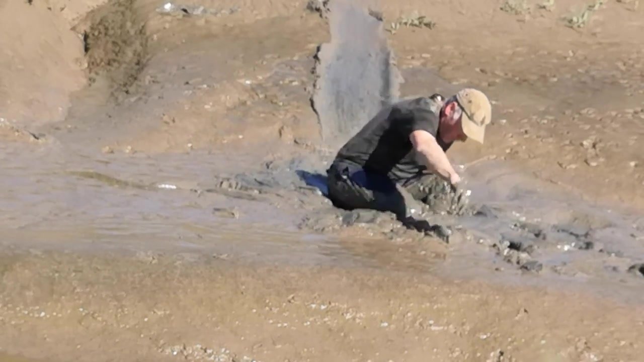 Playing in estuary mud 1
