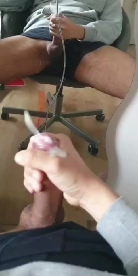 Handjob and cum in front of mirror