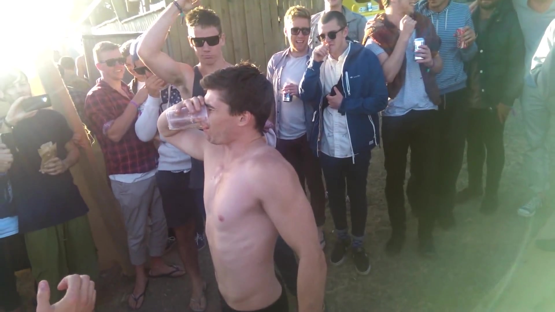 lad drinks pee at festival