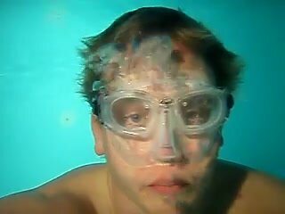 Ripping his mask and breatholding barefaced underwater