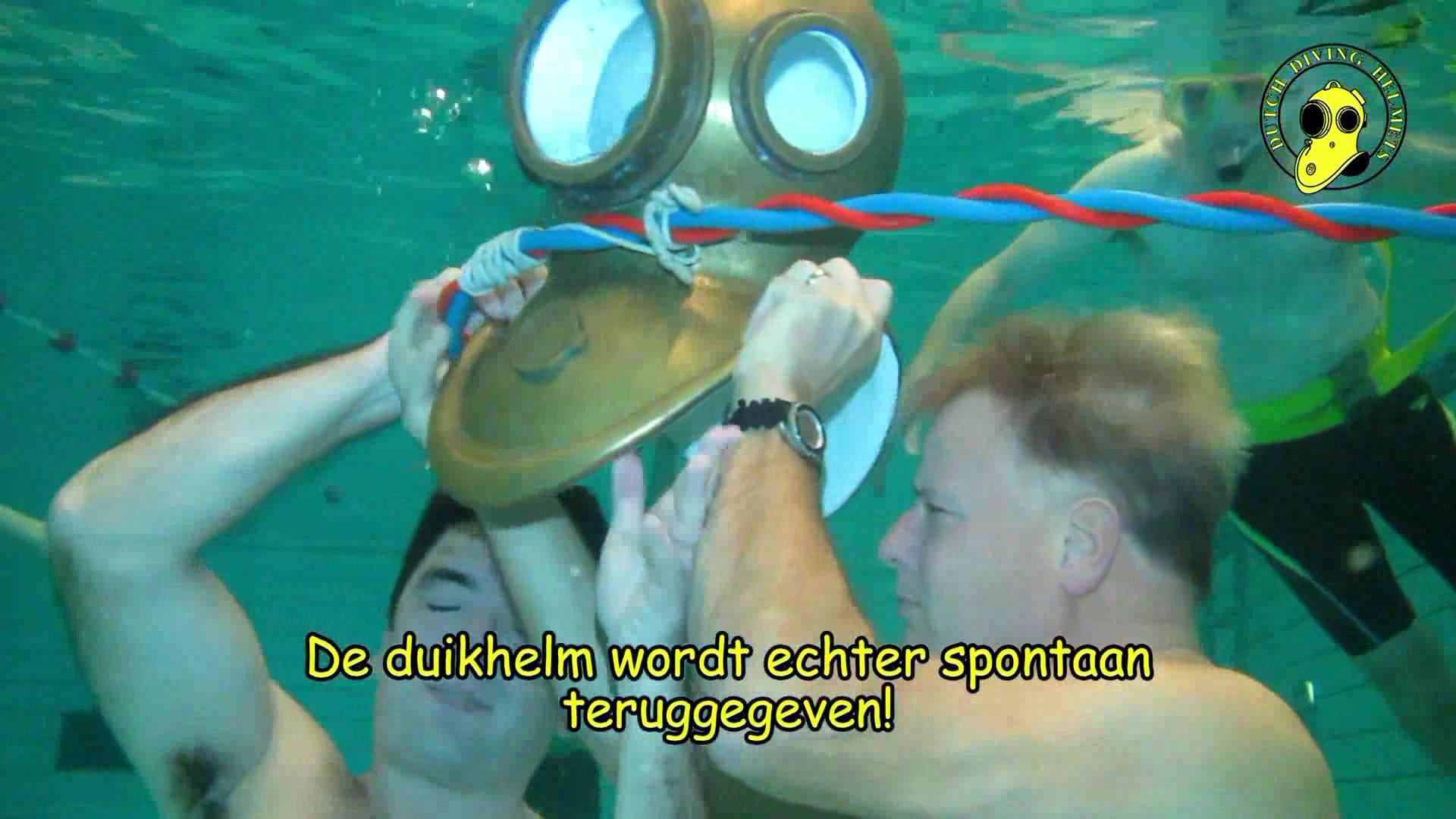 Dutch divers exchanging helmet underwater