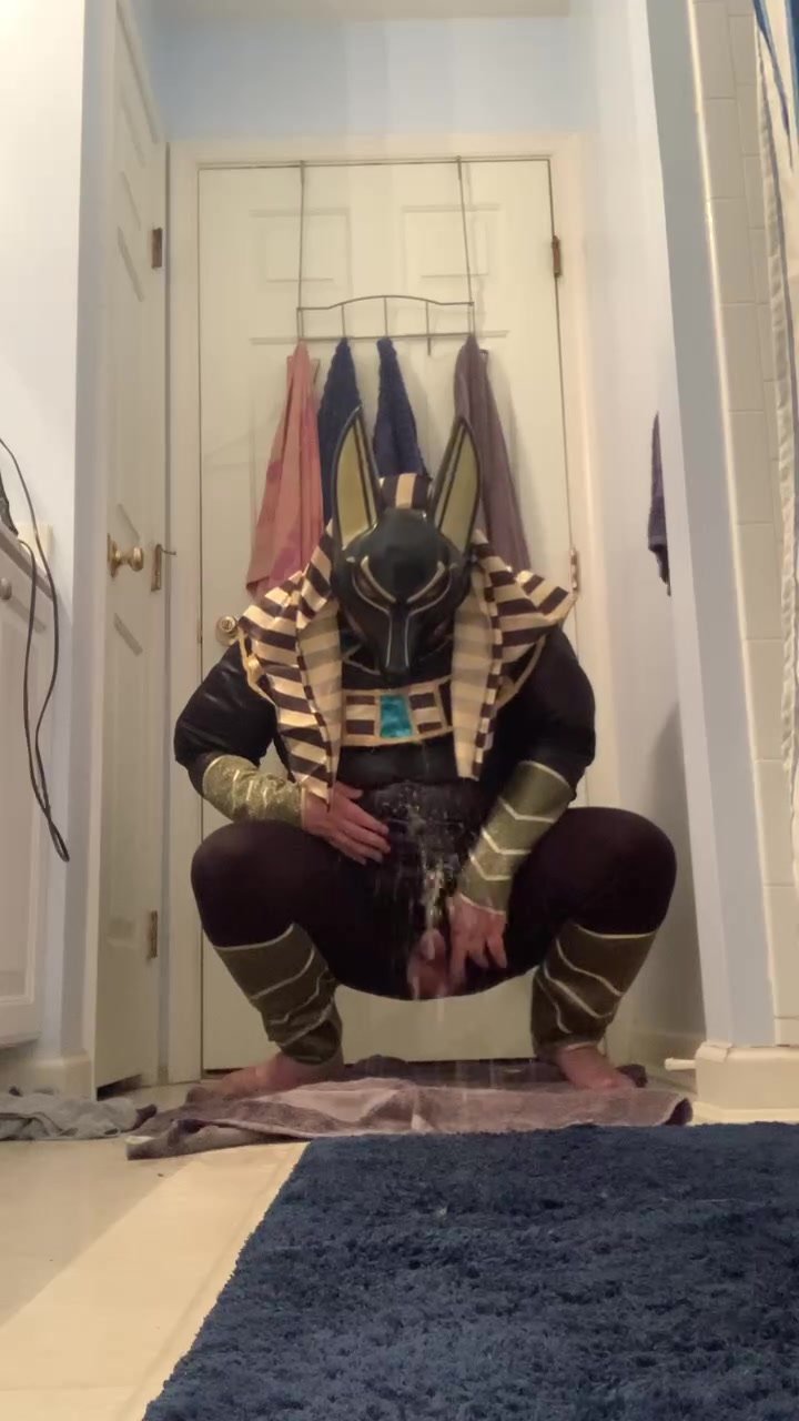 Pissing in another anubis costume