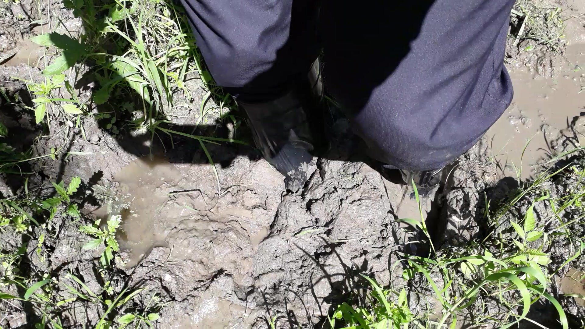 Rubber boots in mud - video 5