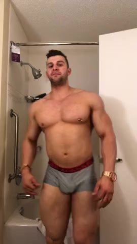 Aussie bodybuilder shows off feet, ass and dick