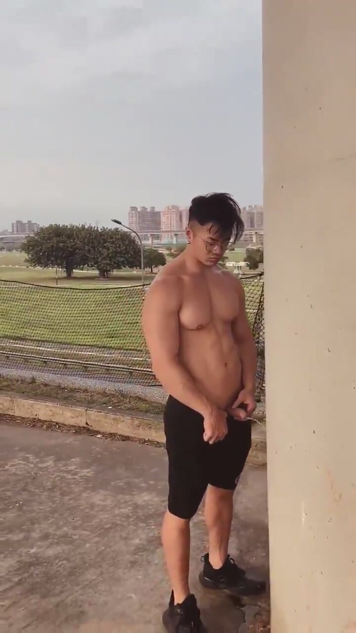 cute asian men pissing outside